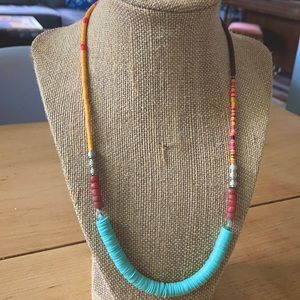 Handmade African vinyl beaded necklace.
